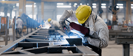 Man working in a manufacturing facility 